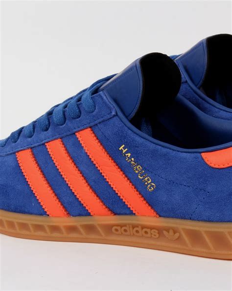 adidas with orange stripes